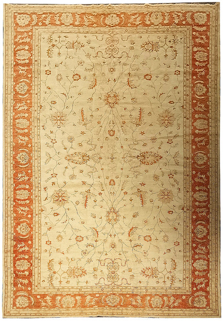 Full view of ivory Chobi Ziegler rug with coral border and all-over sage vine tracery