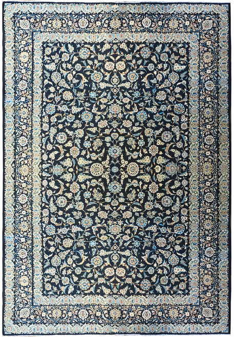 Overhead view of navy blue Persian Kashan rug with ivory all over floral field and borders