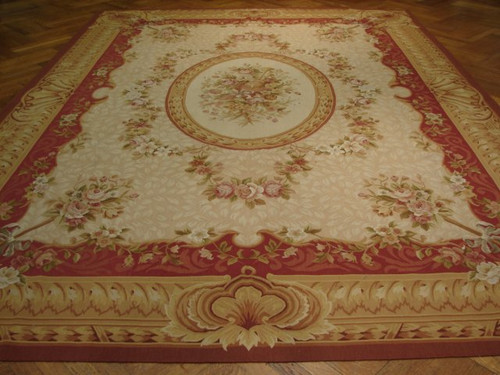 9 x 12 Aubusson rug with ivory floral field, rose medallion and rustic red border