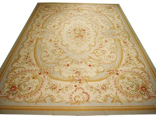 Beige Aubusson rug 12x18 with ivory field, rose bouquets and gold scrollwork shown full view