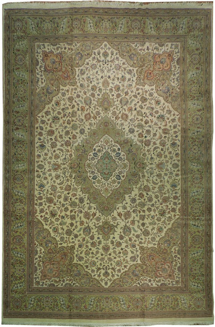 Full overhead view of ivory Persian Tabriz rug with sage medallion and dense floral field