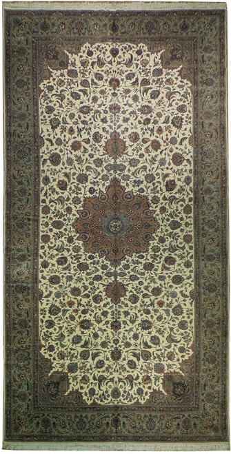 Full overhead view of ivory Persian Tabriz rug with sage border and central rose medallion