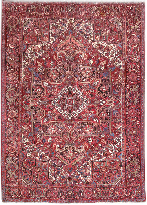 Rustic red Persian Heriz rug with ivory geometric medallion, navy corner spandrels and black palmette border