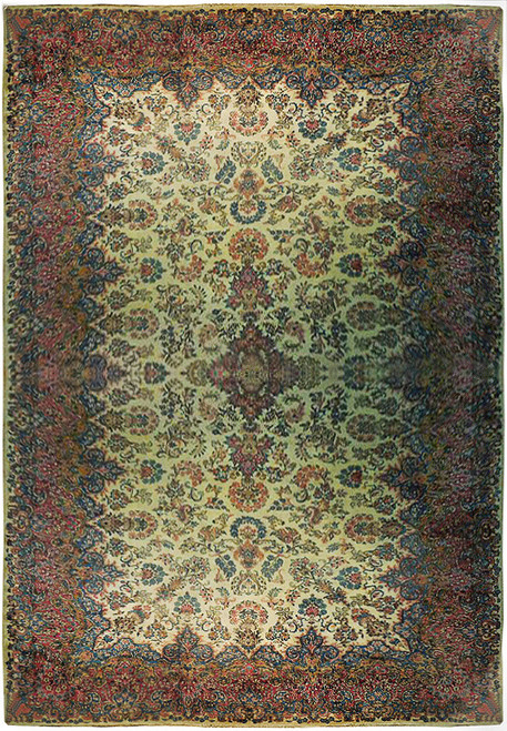 Full overhead view of ivory field Persian Kerman rug with rose border and blue floral vines