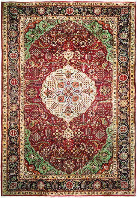 Full overhead view of the Tabriz rug, ivory medallion on red with green corners and navy border