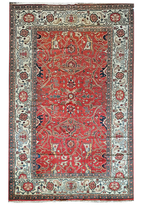Soft coral field and ivory floral border on this hand-knotted 10x16 Mahal design wool rug