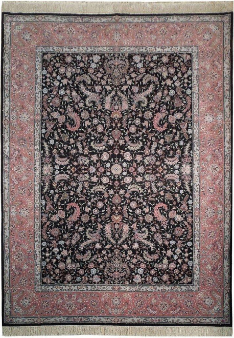 Black field wool and silk rug with rose pink floral border, shown flat from above