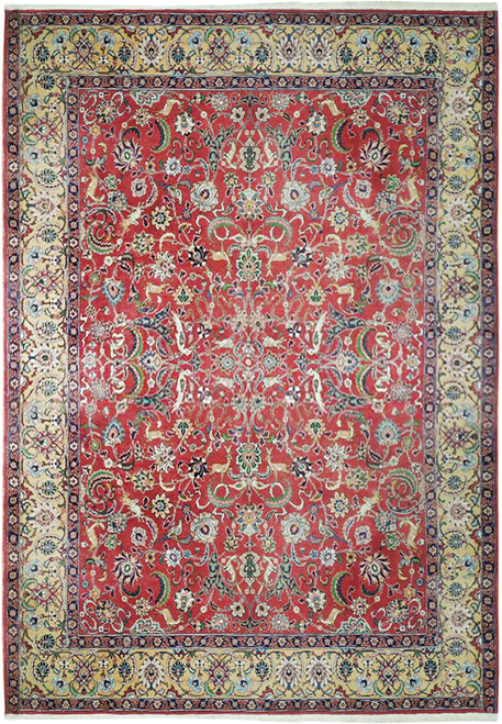 Red field Persian Tabriz rug with soft gold floral border, birds, gazelles and scrolling vine motifs