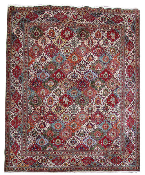 Full overhead view of 10'2" x 13'2" Persian Tabriz rug with all over floral lattice field
