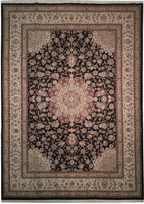 Black field wool and silk Tabriz design rug with ivory floral border and central rose medallion