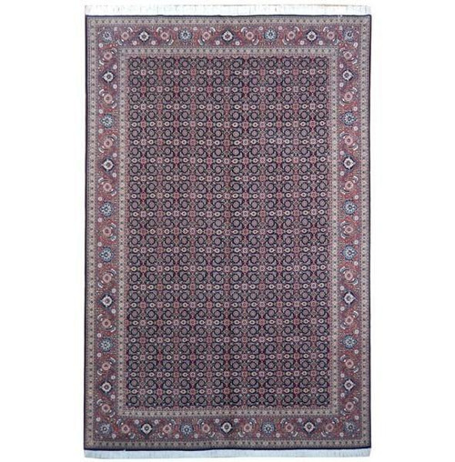 Black Persian Tabriz rug with rust border and repeating Herati fish pattern on white background