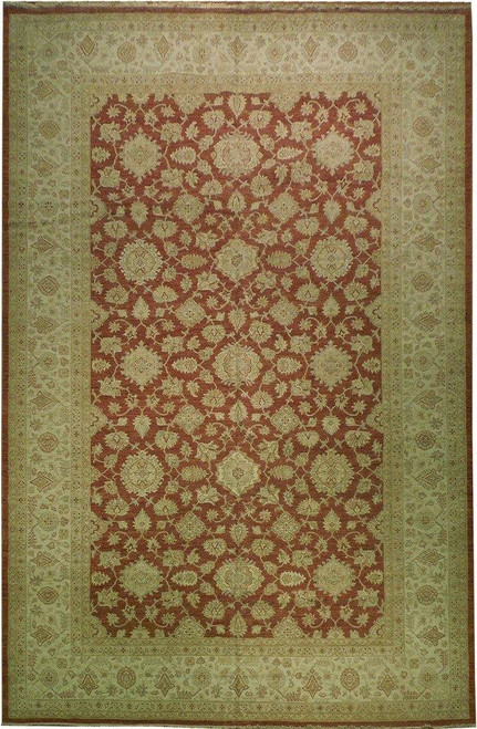 12 x 18 rust red Chobi Ziegler rug shown flat with wide sage beige floral border