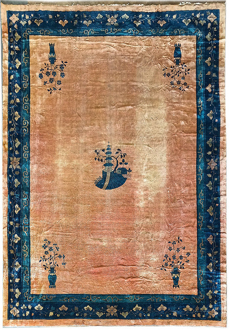 Antique Chinese Art Deco rug with salmon field, indigo floral border and central pagoda landscape