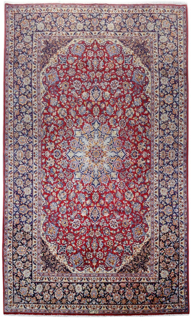 Full overhead view of 9'10" x 16'5" Persian Isfahan rug with brick red floral field