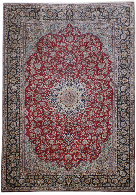11'4 x 16'1 Persian Isfahan rug with red field, ivory medallion and navy floral border