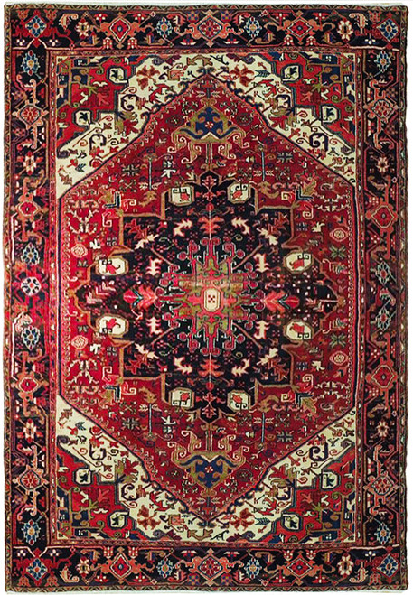 Full overhead view of red Persian Heriz rug with graphite black medallion and ivory spandrels