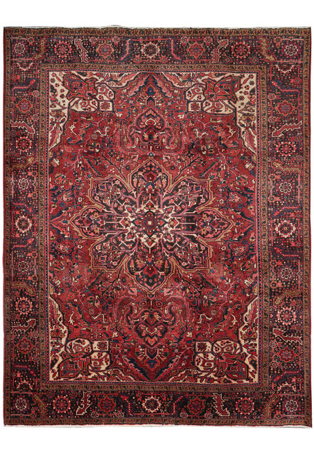 10'1" x 13' Persian Heriz rug with burgundy field, navy star medallion and ivory corners