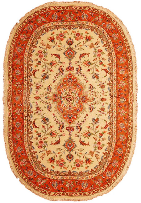 Full view of ivory 4' x 7' Persian Tabriz oval rug with orange floral border