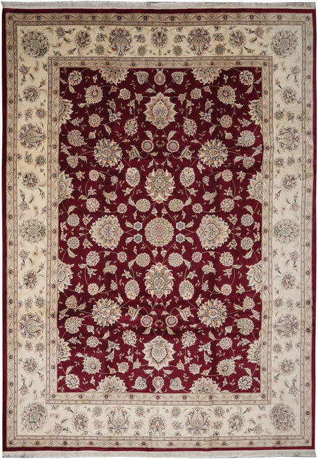 Deep ruby red all-over floral field framed by wide ivory palmette border, hand-knotted wool and silk