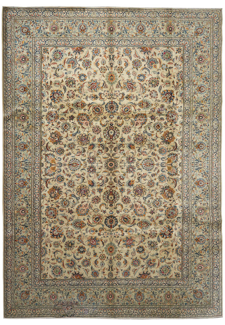 Full overhead of ivory 9'6" x 12'10" Persian Kashan rug with dense all over floral field