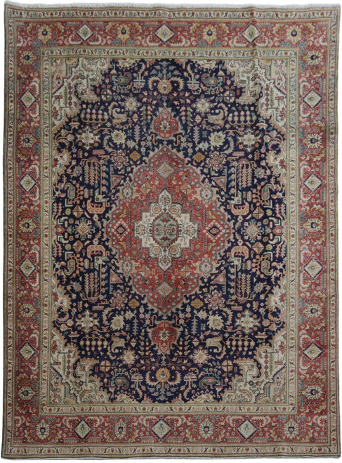 Navy blue Persian Tabriz rug 9'6" x 12'10" with brick red medallion and ivory corner spandrels