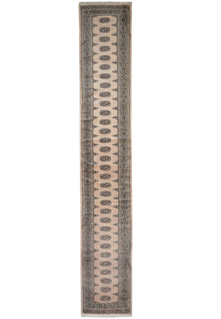 Full length view of tan Bokara runner rug with single column of black outlined guls