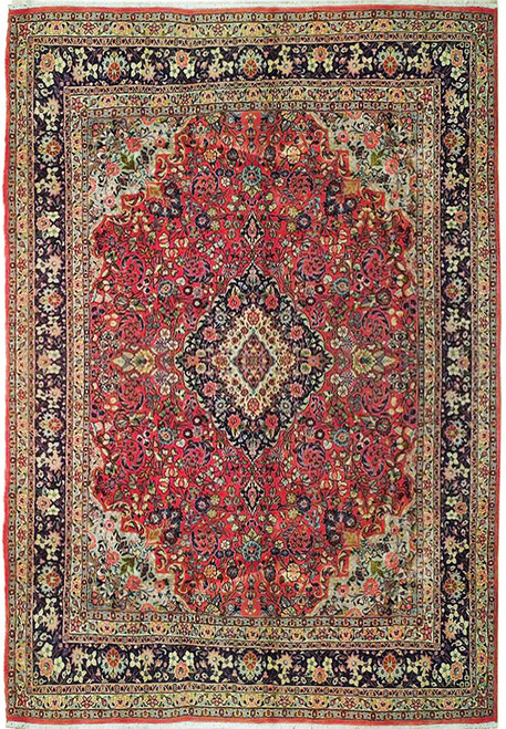 Soft tomato red Persian Sarouk rug with navy floral border and ivory diamond center medallion