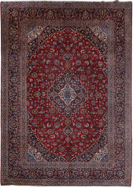 Red Persian Kashan rug with navy lobed medallion, ivory spandrels and dense all-over floral field