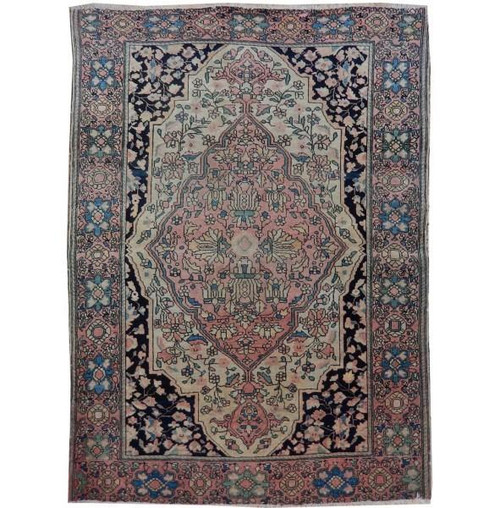 Antique Persian Farahan Sarouk rug with ivory field, rose medallion and navy floral border