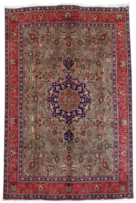 Olive green Persian Tabriz rug with navy star medallion and red floral main border, overhead view