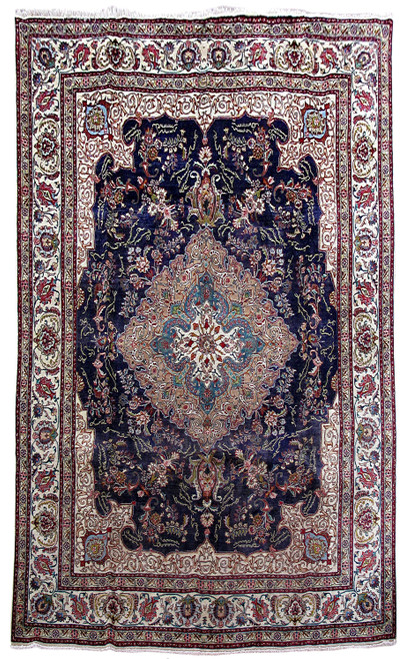 Navy blue Persian Tabriz rug with ivory floral border and salmon central medallion, full overhead view