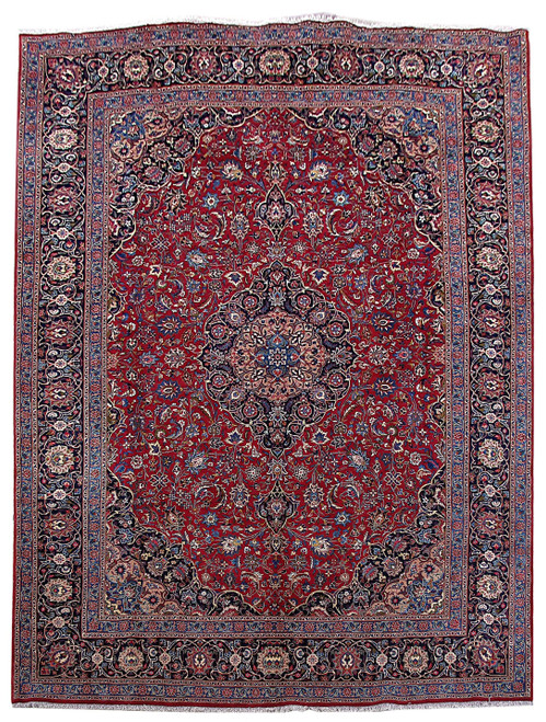 Full overhead view of 9'9" x 13'4" Persian Kashmar rug with red field and navy border