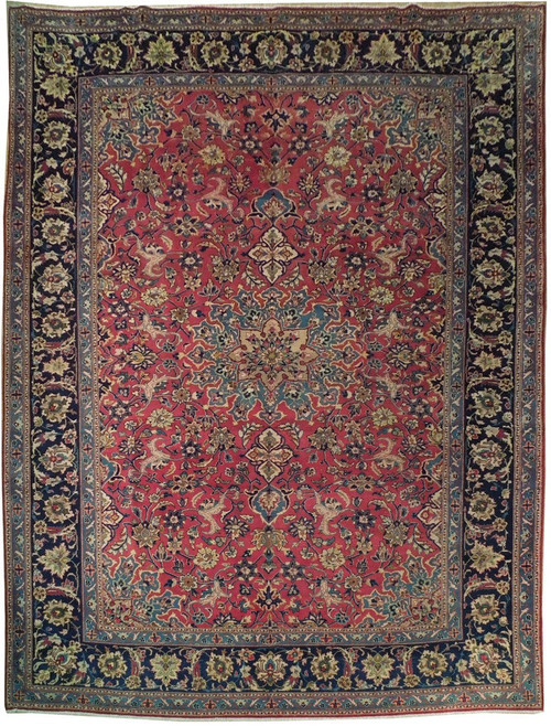 10'3" x 13'2" Persian Tabriz rug with red field, navy floral border and ivory medallion