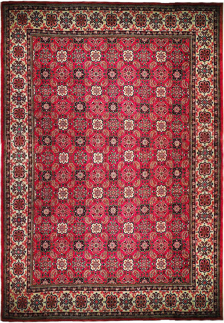 Deep rose pink Persian Varamin rug with ivory rosette border and all-over boteh field design