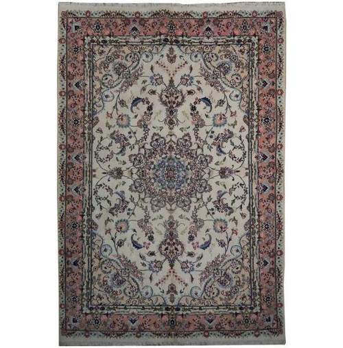 Ivory Persian Tabriz rug photographed flat, pink border framing a blue floral medallion field