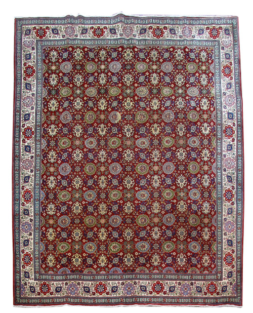 Full overhead view of 10'4" x 13'2" red Persian Tabriz rug with all-over floral field