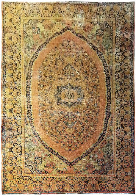 Full overhead view of antique Persian Sarouk rug with coral field and navy elongated medallion