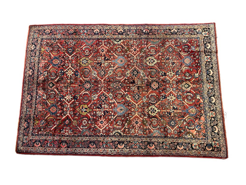 Full overhead view of 8' x 11'5" antique Persian Mahal rug with rustic red all over field