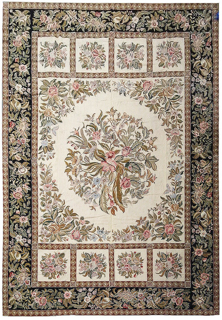 Full overhead view of 12' x 18' ivory Chinese needlepoint rug with black floral border