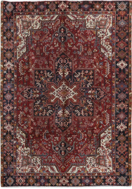 8' x 11'2" Persian Heriz rug with brick red field and navy stepped medallion
