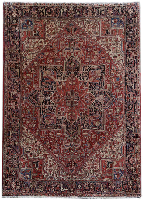 Salmon red Persian Heriz rug with navy stepped medallion and ivory corner spandrels, 8x12 size