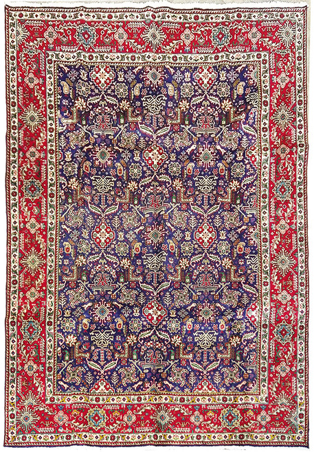 Overhead view of 8' x 11'5" Persian Tabriz rug with violet blue field and red border