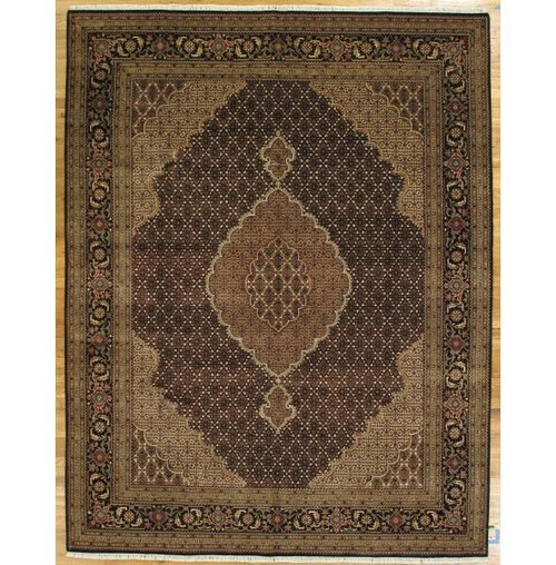 Black Mahi Tabriz design rug with ivory lobed medallion and sage green floral border