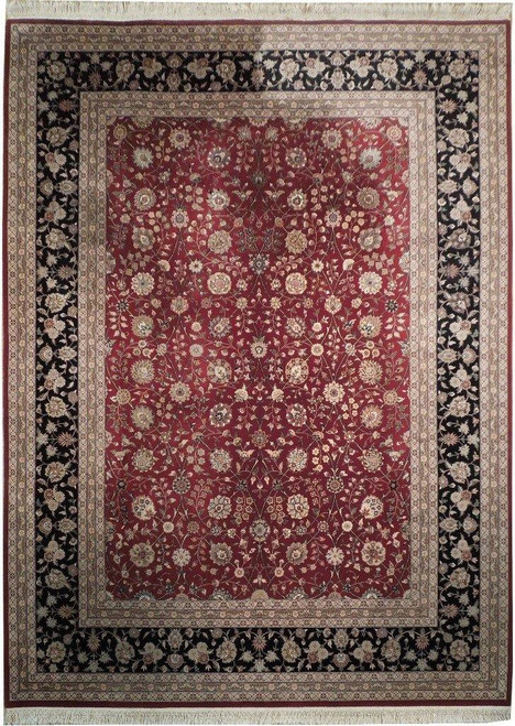Red and black wool and silk rug with all-over floral Tabriz design and ivory borders
