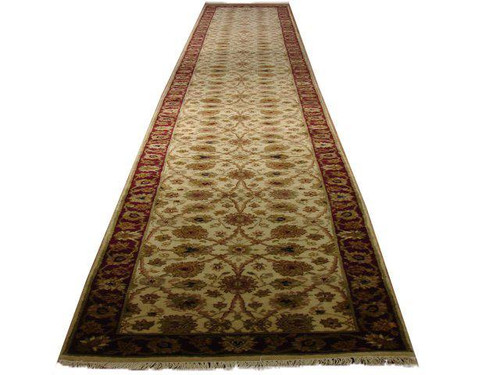 2'6" x 20'2" Indian runner rug shown full length with ivory field and red border