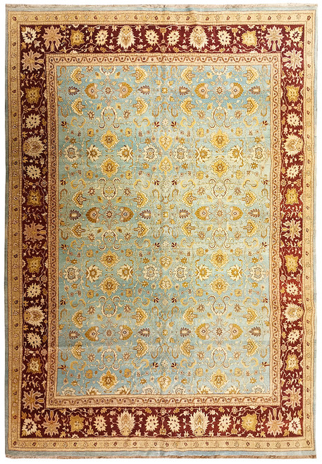 Light blue Ziegler rug with burgundy floral border and gold all-over vine pattern, full view