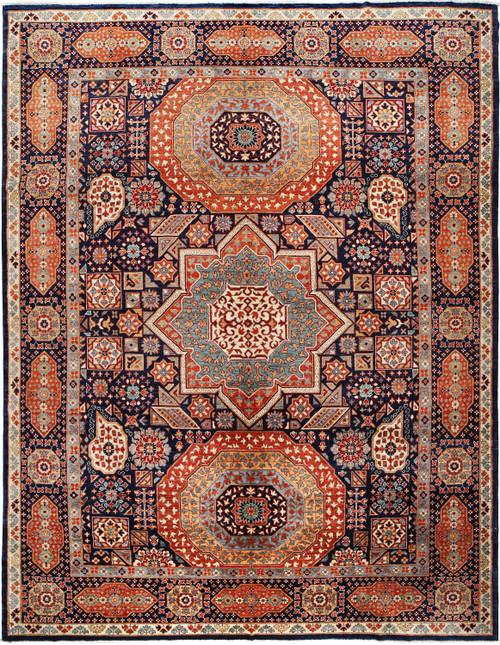 9'10" x 12'10" Super Kazak rug with navy field, rust octagon medallions and ivory floral border