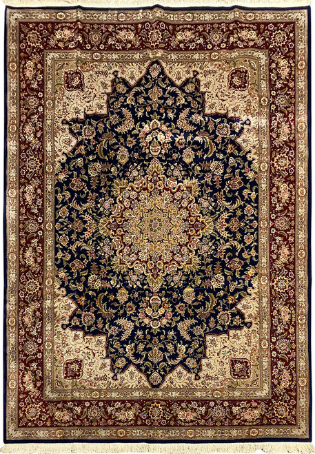 Navy blue and burgundy Sino-Tabriz wool and silk rug with ivory floral medallion, overhead view
