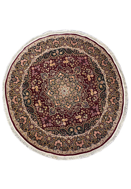 Burgundy and black round Oriental rug with ivory floral border and central ivory medallion