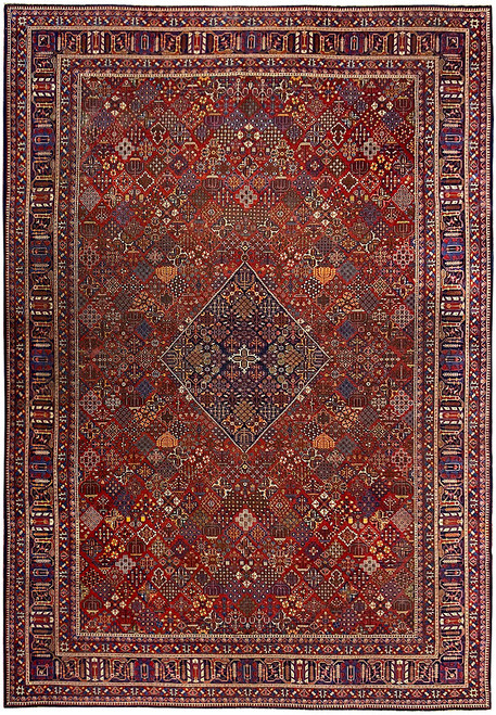 Burgundy and navy Persian Joshagan rug with diamond lattice field and stepped indigo center medallion